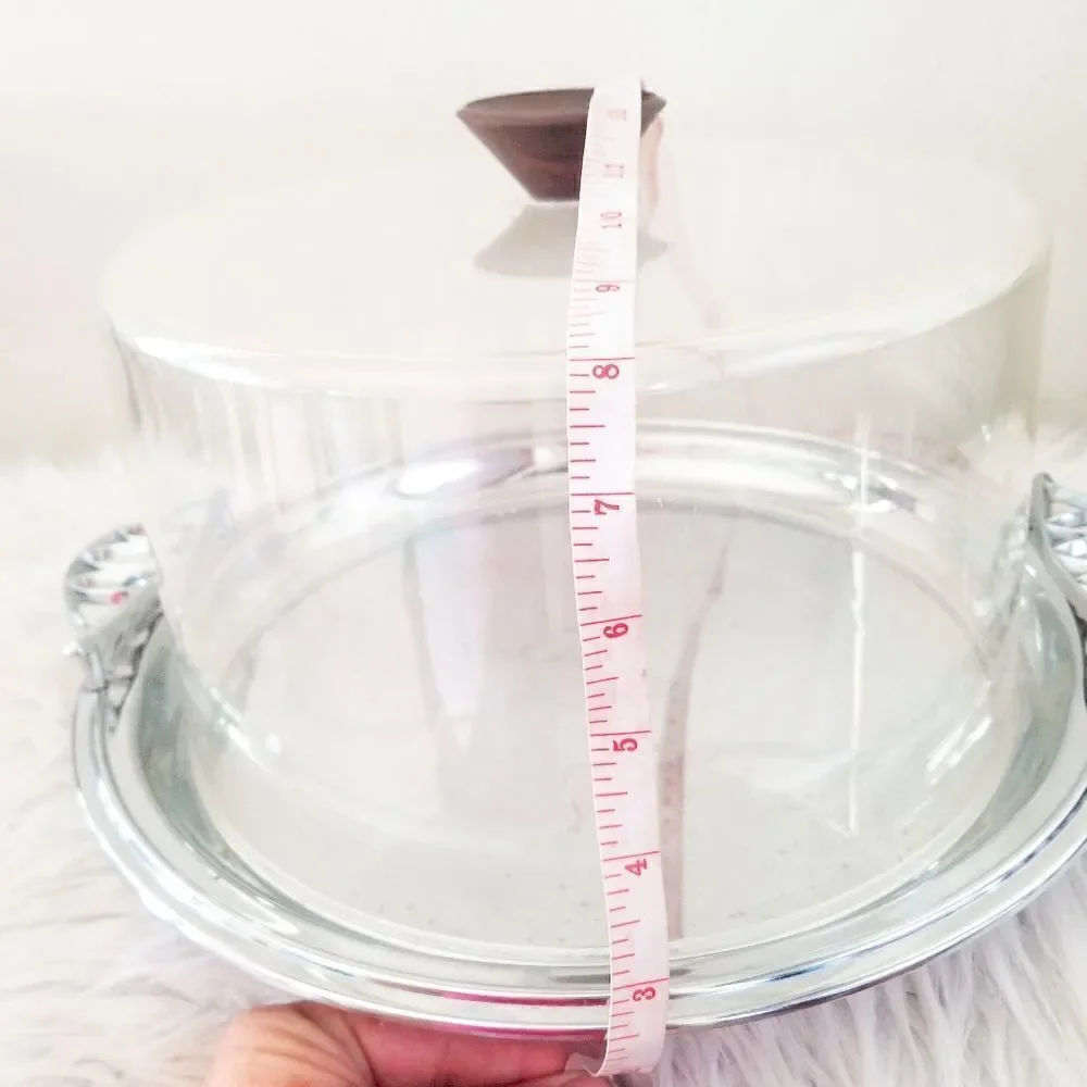 Vintage cake plate with plastic top metal base